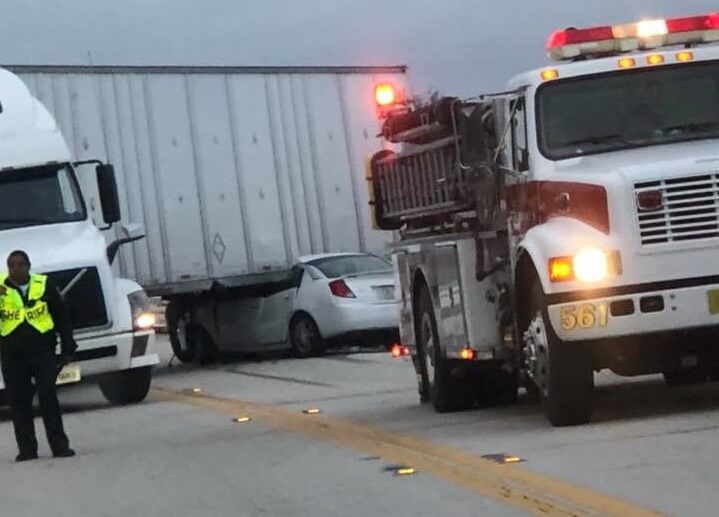 Woman Escapes Serious Injury When Car Goes Under Semi-Trailer On Polk City Road