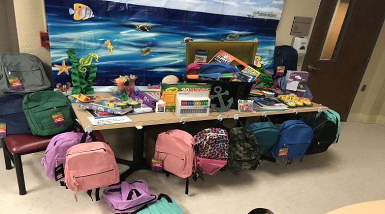 LWMC EMPLOYEES DONATE BACKPACKS FOR LOCAL STUDENTS