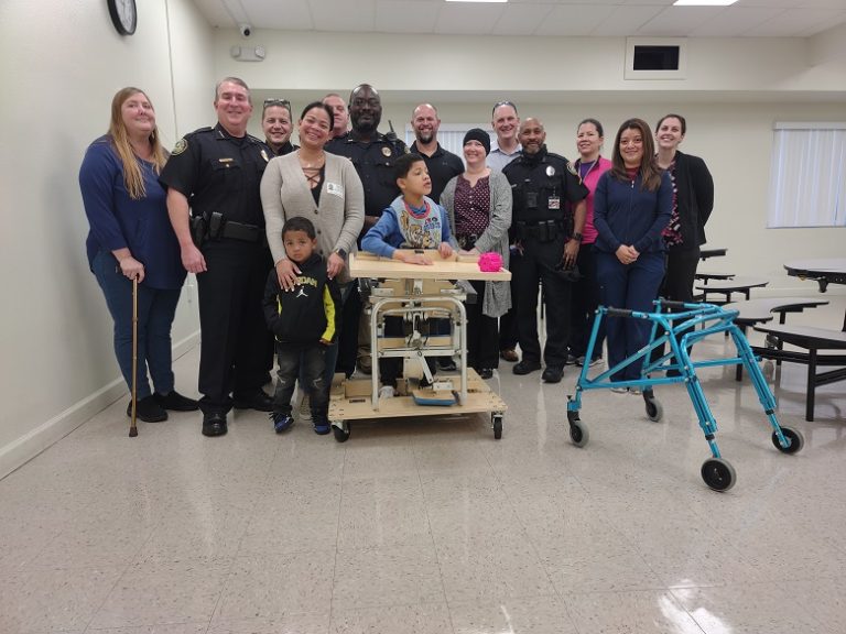 Police Officers Association Gifts Victory Ridge Academy Student a Mobility Device