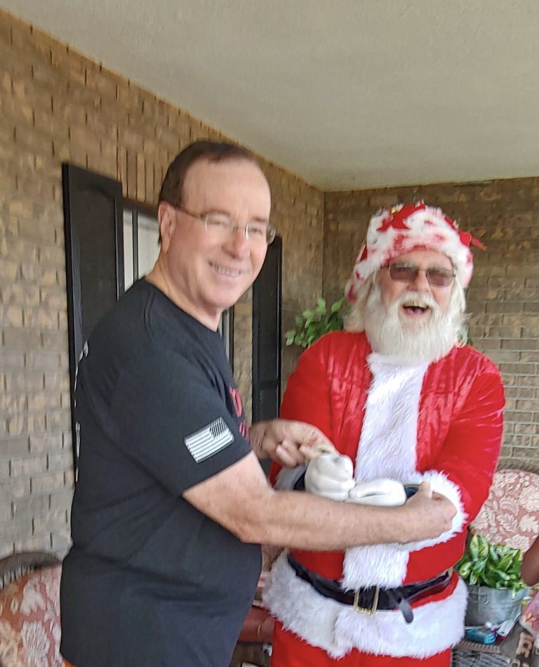 This Frostproof Man Loves Playing Santa—Especially for Sheriff Grady Judd! 