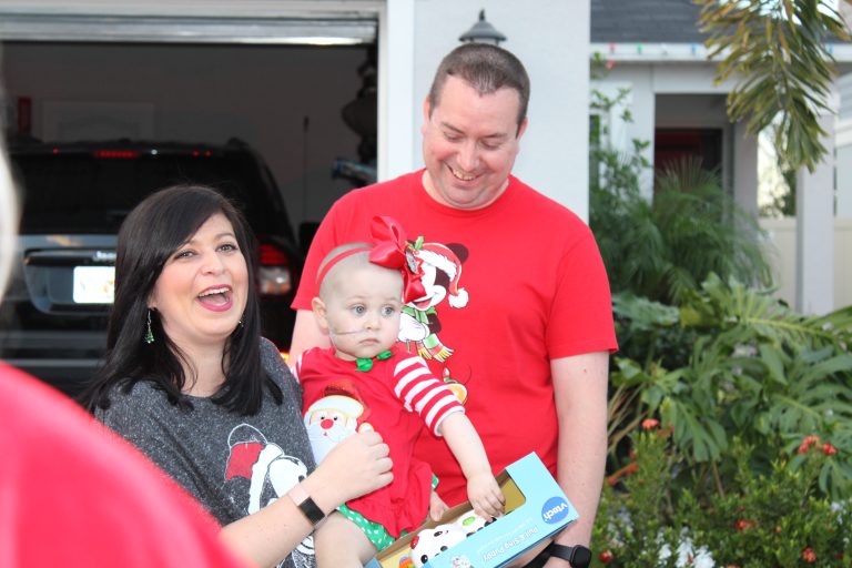 Davenport Toddler Battling Rare Pediatric Cancer Gets Special Visit from Santa & Mrs. Claus
